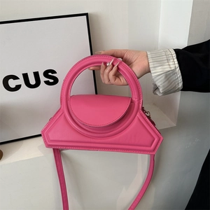 Fuchsia geometrische handtas met rond handvat en afneembare riem van imitatieleer
