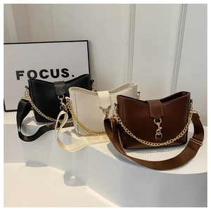 Three elegant leather crossbody bags in black, beige, and coffee with gold chain detail