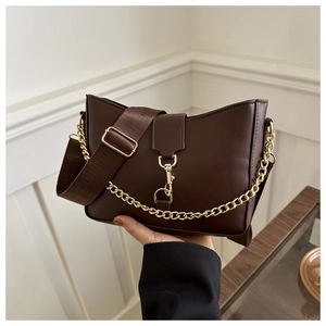 Minimalist dark brown PU leather crossbody bag with wide strap and gold chain detail