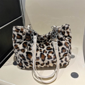 Plush leopard print tote bag with faux fur texture and elegant silver chain strap