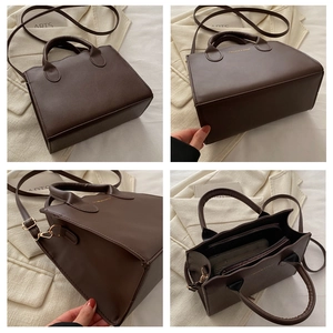 Detail view of coffee brown tote bag with adjustable strap and organized inner compartments