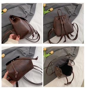 Multi-angle views of brown vintage mini backpack showing back, side, base and inner lining