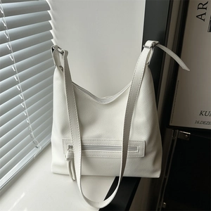 White lychee leather hobo bag with adjustable shoulder strap for daily commuting