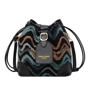 Fashionable knit bucket bag with multi-color wave pattern and black leather accents