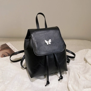 Vintage black PU leather backpack for women featuring an elegant metal butterfly buckle