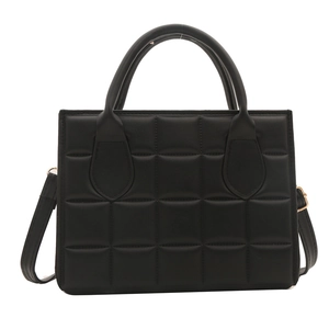 Classic black quilted handbag for women with dual top handles and gold-tone hardware detail