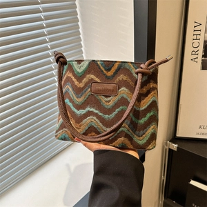 Retro knitted tote bag with wave pattern, leather strap and knot detail for women