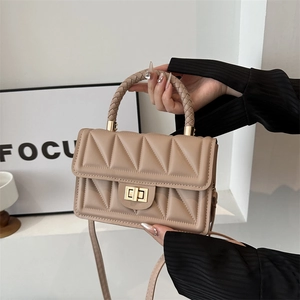 Chic beige quilted square crossbody bag with woven handle and gold lock closure