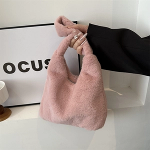 Plush pink faux fur hobo handbag with knotted handle and zipper for spring fashion