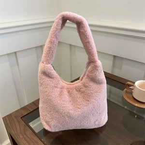 Pink plush faux fur handbag with zipper and top handle for spring 2024 fashion
