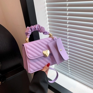Chic lavender pleated handbag with gold heart clasp and matching mini card pouch