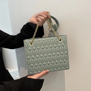 Large capacity sage green quilted tote bag with gold chain strap and crossbody leather strap