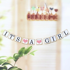 It's a Girl banner with gold edges and pink hearts for baby shower party backdrop