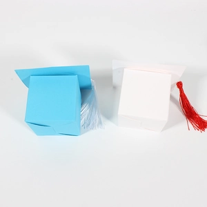European style graduation cap candy gift boxes with tassels in blue and white colors