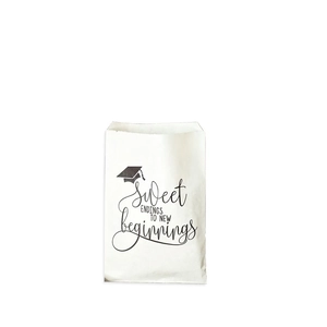 White paper graduation gift bag with 'Sweet Endings' text and doctoral cap icon