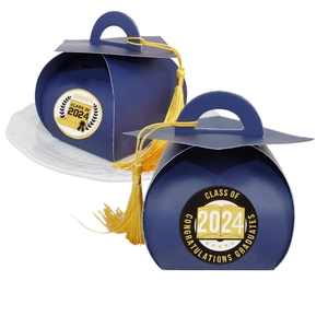 Close-up of doctoral cap gift box with yellow tassel for 2024 graduation party sweets