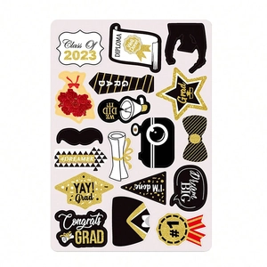 Detailed view of Graduation photo booth props including Class of 2023 signs and stars