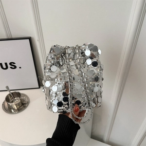 Chic silver sequin bucket bag with chain strap and drawstring closure for women