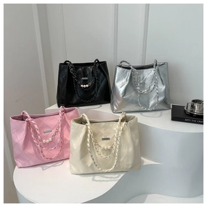 Quilted tote bags in black silver pink and white with chain straps and pearl charms