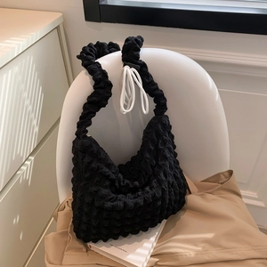 Fashionable black pleated shoulder bag with textured bubble fabric in 2024 spring style