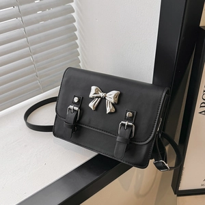 Chic black bow square crossbody bag for women with silver buckle and adjustable strap