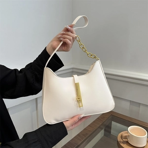 Minimalist beige leather hobo underarm bag with gold lock and chain strap for women
