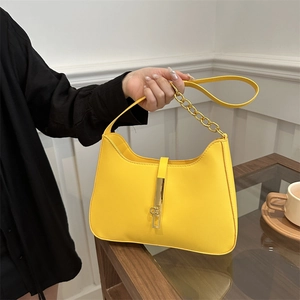 Vintage yellow semi-moon hobo underarm bag with gold metal buckle and chain strap