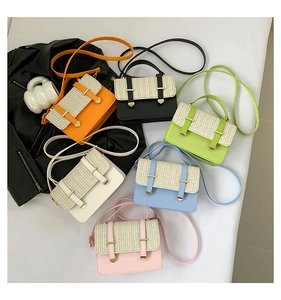 Flat lay of six colorful contrast handbags with woven texture lids and leather straps