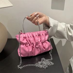 Pink pleated dumpling bag with rhinestone ring handle and silver chain strap for women