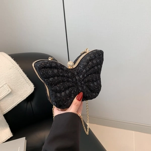 Sac de soirée papillon en paillettes noires avec chaîne dorée et fermoir diamant