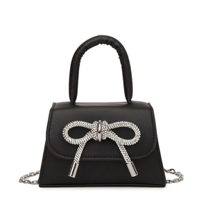 Mini black leather tote bag with sparkling rhinestone bow and silver chain strap