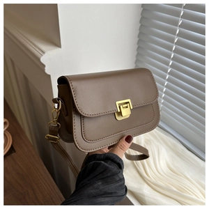 Detail showing the vintage gold square clasp and premium matte PU leather texture