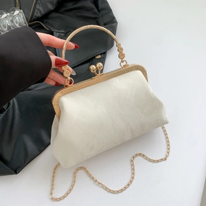 Sac à main vintage ivoire marbré avec poignée dorée et bandoulière amovible