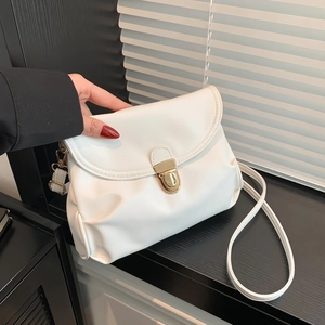Chic white pleated crossbody bag for women with gold clasp and adjustable shoulder strap