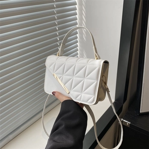 Elegant white quilted PU leather crossbody bag with gold hardware and top handle