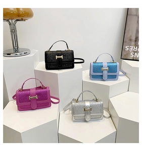Close-up of glitter finish fashion bags with H-shaped metal buckles in four colors
