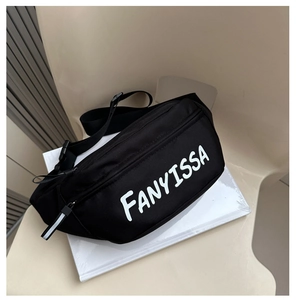 Detail of black nylon belt bag featuring white FANYISSA logo and adjustable strap