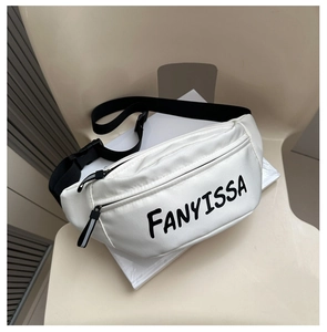 Detail of white sports waist bag showing the black logo print and reflective zipper puller