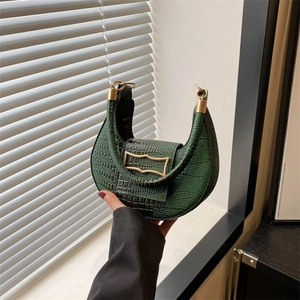Green crescent hobo bag with crocodile texture and gold hardware for 2024 fashion