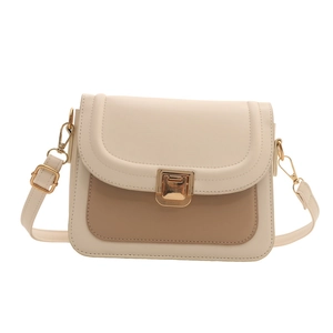 Sac bandoulière tendance bicolore beige et marron avec fermoir tournant doré