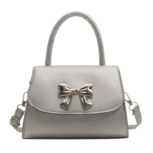 Elegant grey square handbag with silver metal bow and adjustable shoulder strap