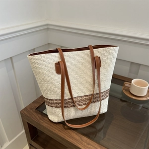Large capacity woven bucket tote bag with brown lace trim and leather handles