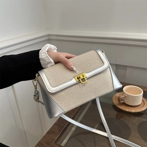 Chic beige woven crossbody bag with metallic silver trim and golden square lock closure