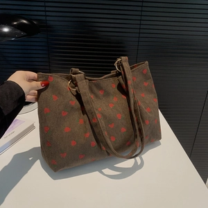 Brown corduroy tote bag with strawberry print and gold metal rings for women