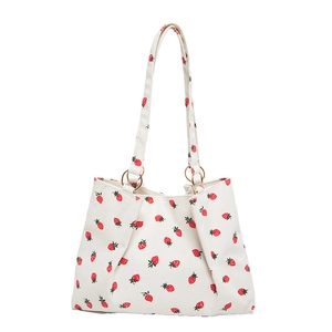 Chic white corduroy tote bag with strawberry print and metal rings for women