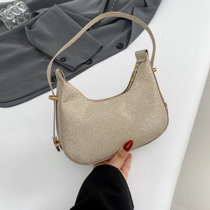 Sparkly champagne gold woven hobo shoulder bag for women with elegant metallic finish