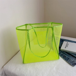 Borsa tote in rete trasparente giallo neon con tracolla per stile spiaggia estiva