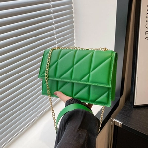 Green quilted leather crossbody bag with gold chain strap and stylish diamond stitching