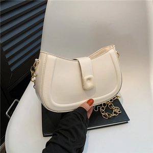 Minimalist cream crescent crossbody bag with stylish gold chain and matte PU leather finish