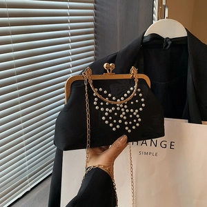 Elegant black silk evening bag with pearl butterfly design and gold chain strap